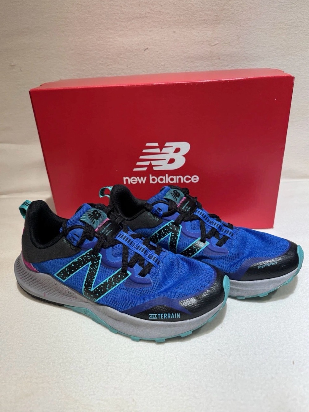 New Balance Blue and Teal All-Terrain Running Shoes